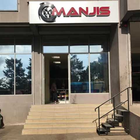 The Manjis Service tyre shop entrance in Arusha