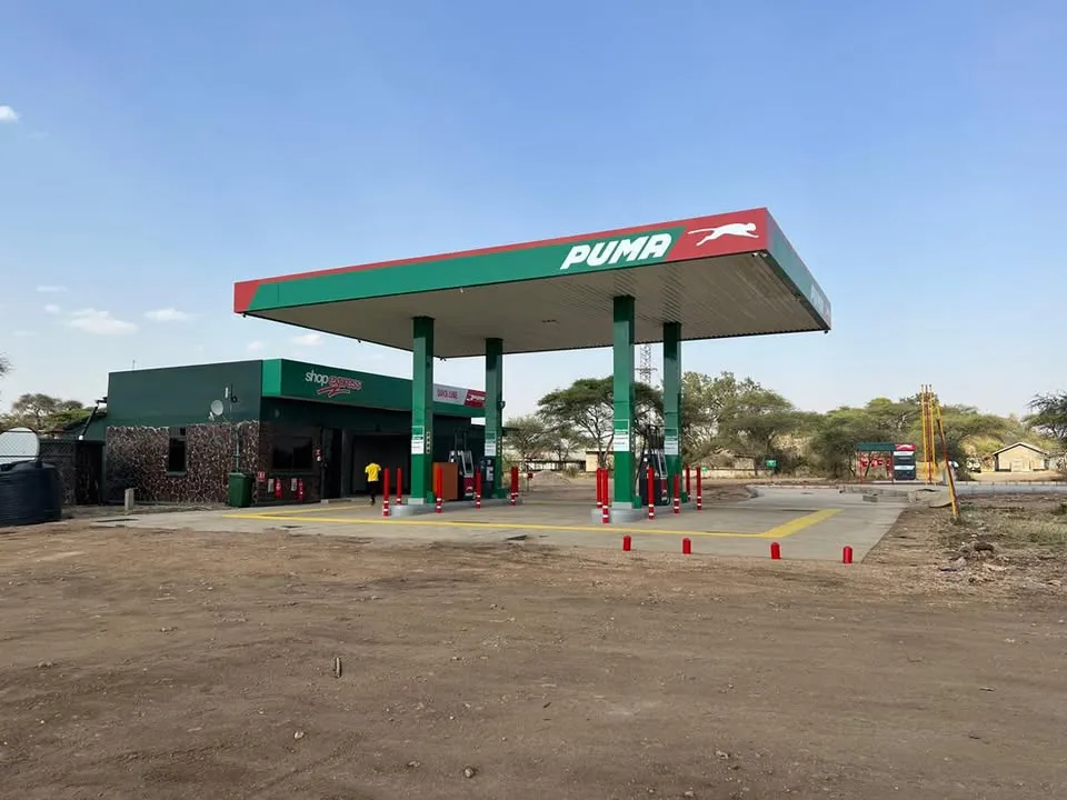 A Manjis Petroleum service station with a Puma canopy, shop and forecourt